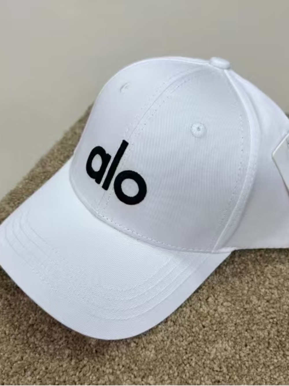 ALO Yoga White Baseball Cap with Black Logo